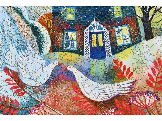 A closeup of the front of the puzzle, Snowbirds, showing the detail in the pieces.