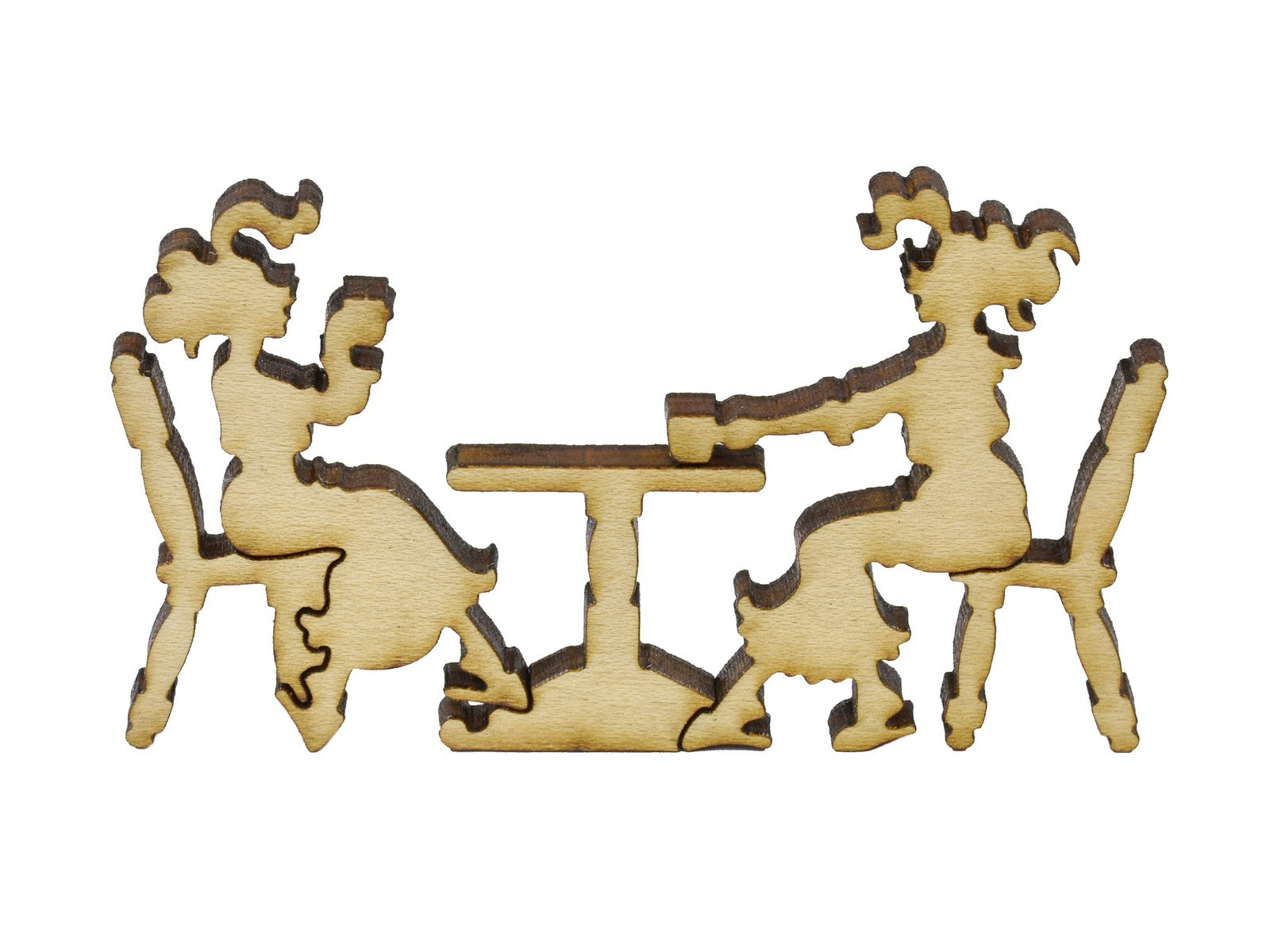 A closeup of pieces in the shape of two people sitting at a table.