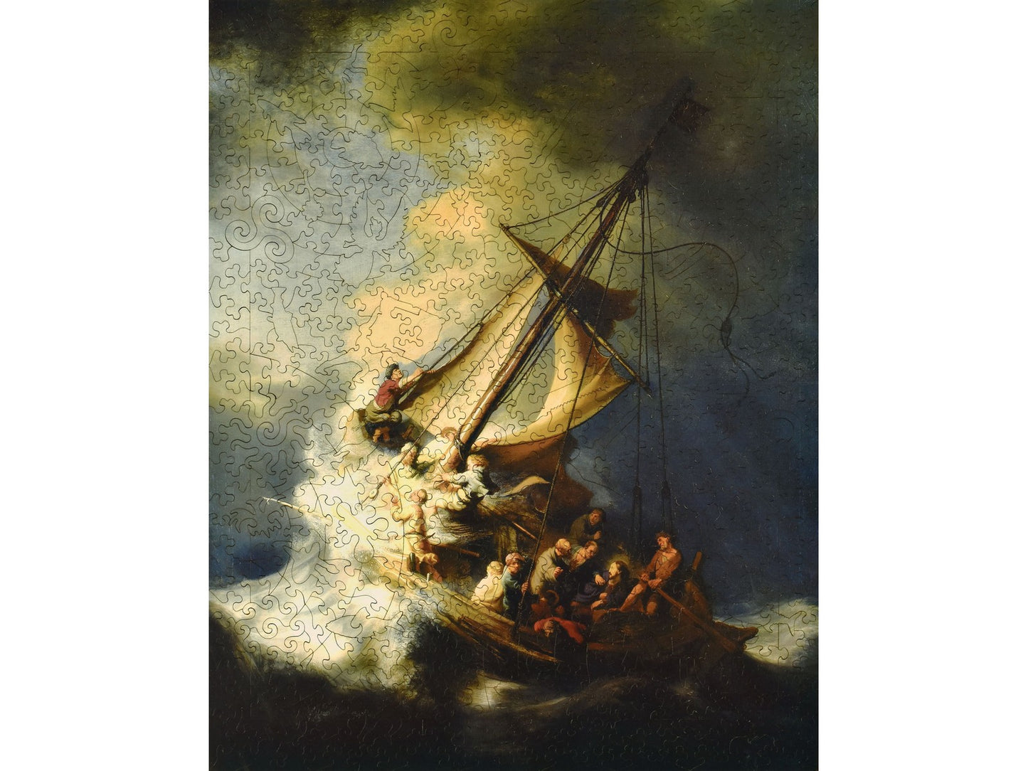 The front of the puzzle, Storm on the Sea of Galilee, which shows a boat of people on a stormy ocean.