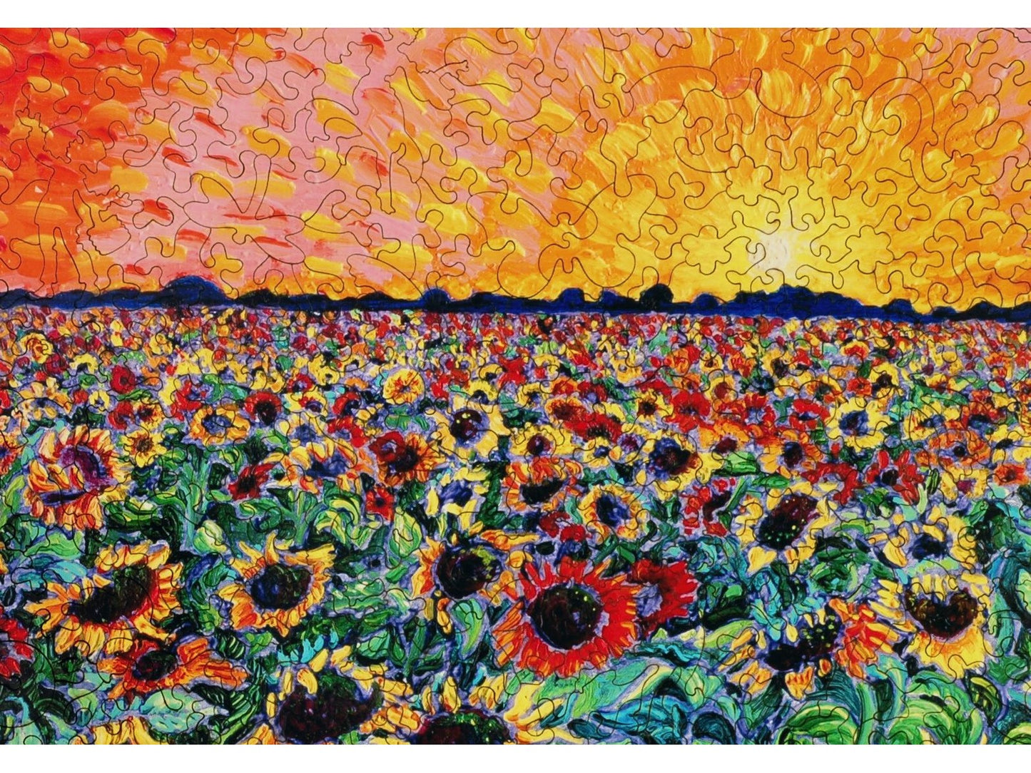A closeup of the front of the puzzle, Sunflower Splatter Paint, showing the detail in the pieces.