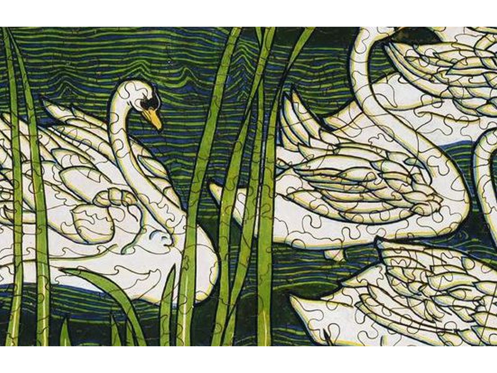 A closeup of the front of the puzzle, Swans, showing the detail in the pieces.