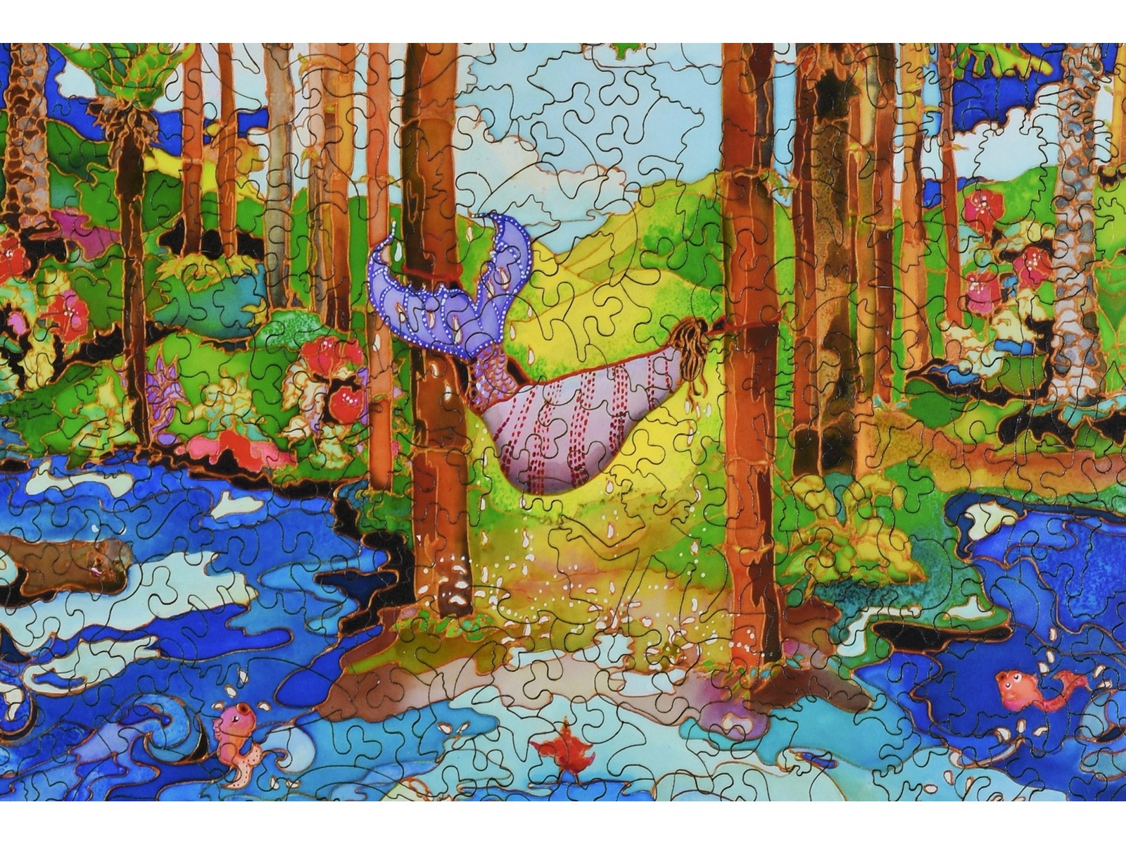 A closeup of the front of the puzzle, The Girl and The Sea, showing the detail in the pieces.