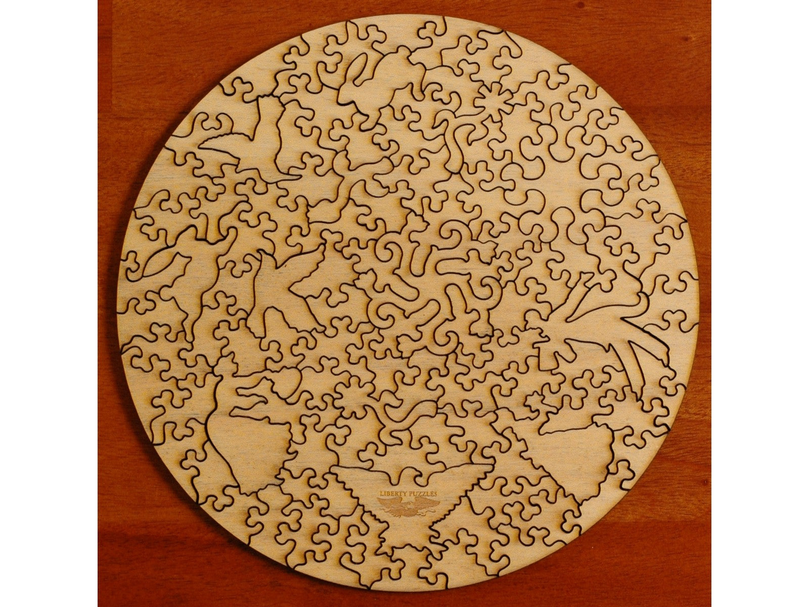 https://libertypuzzles.com/cdn/shop/files/the-kiss-round-back-XL-wooden-jigsaw-puzzle.jpg?v=1688670158&width=1946