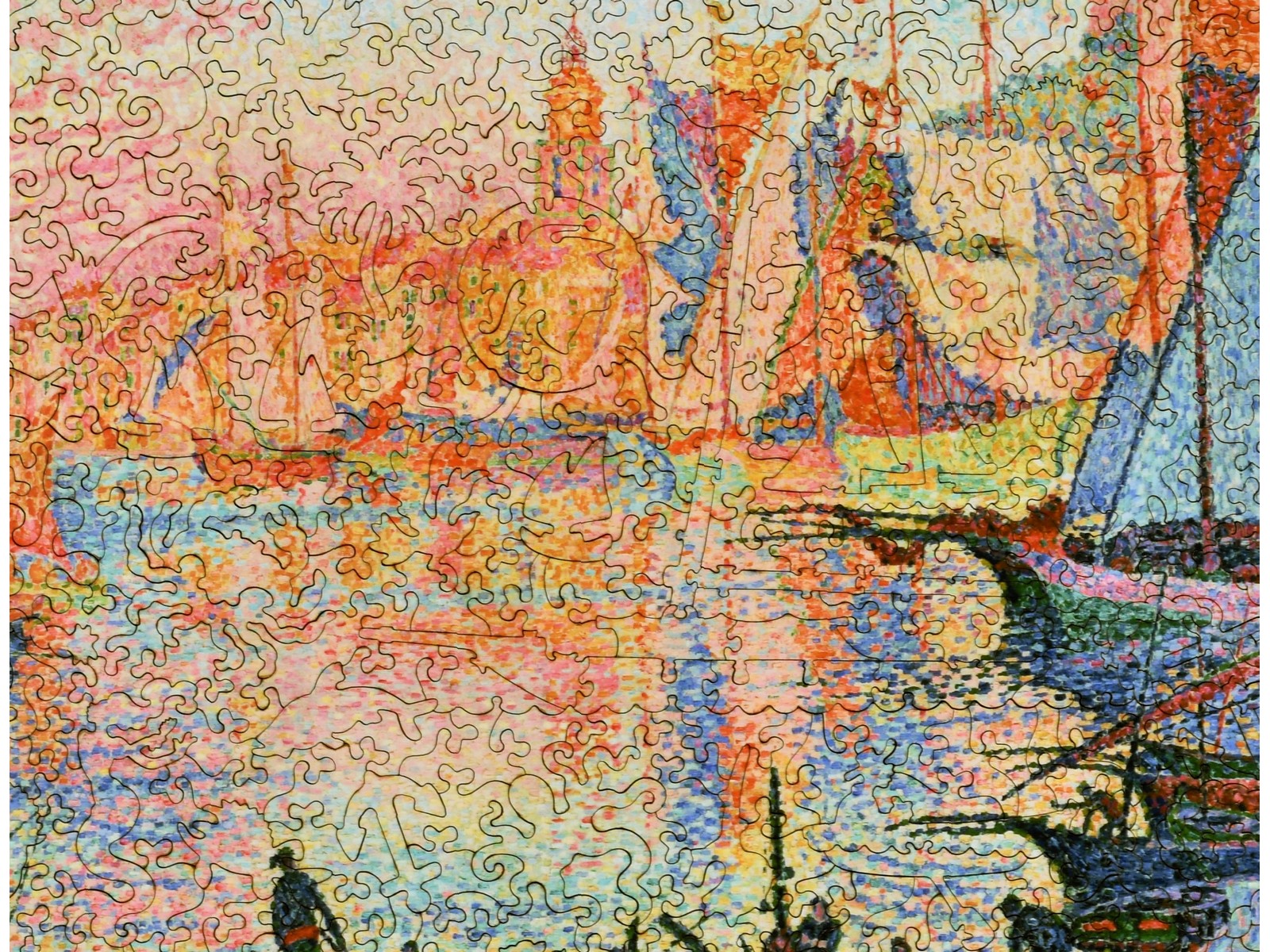 A closeup of the front of the puzzle, The Port of Saint-Tropez, showing the detail in the pieces.