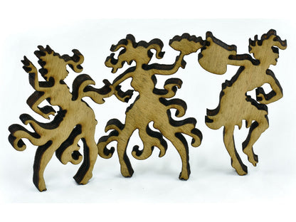 A closeup of pieces shaped like three dancers.