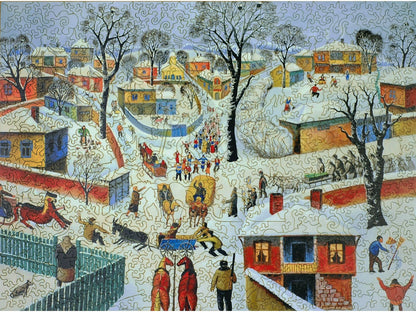 The front of the puzzle, This is Life, which shows a winter scene in a village.