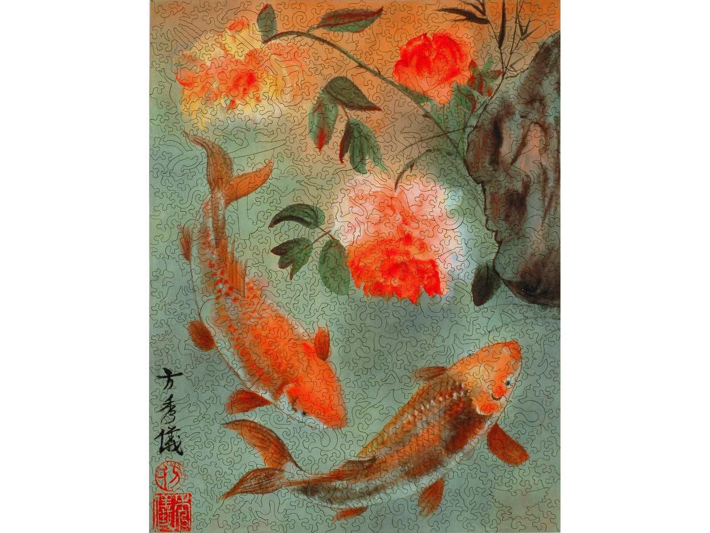 The front of the puzzle, Two Koi, which shows two fish swimming in a pond surrounded by flowers.