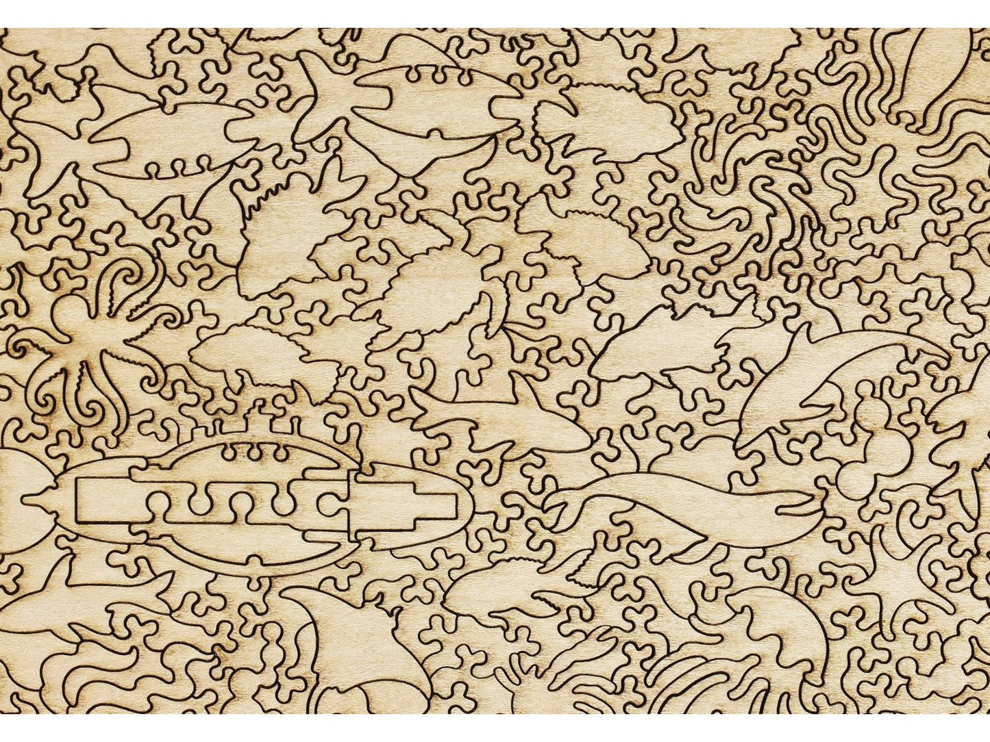 A closeup of the back of the puzzle, Under the Sea, showing the detail in the pieces.