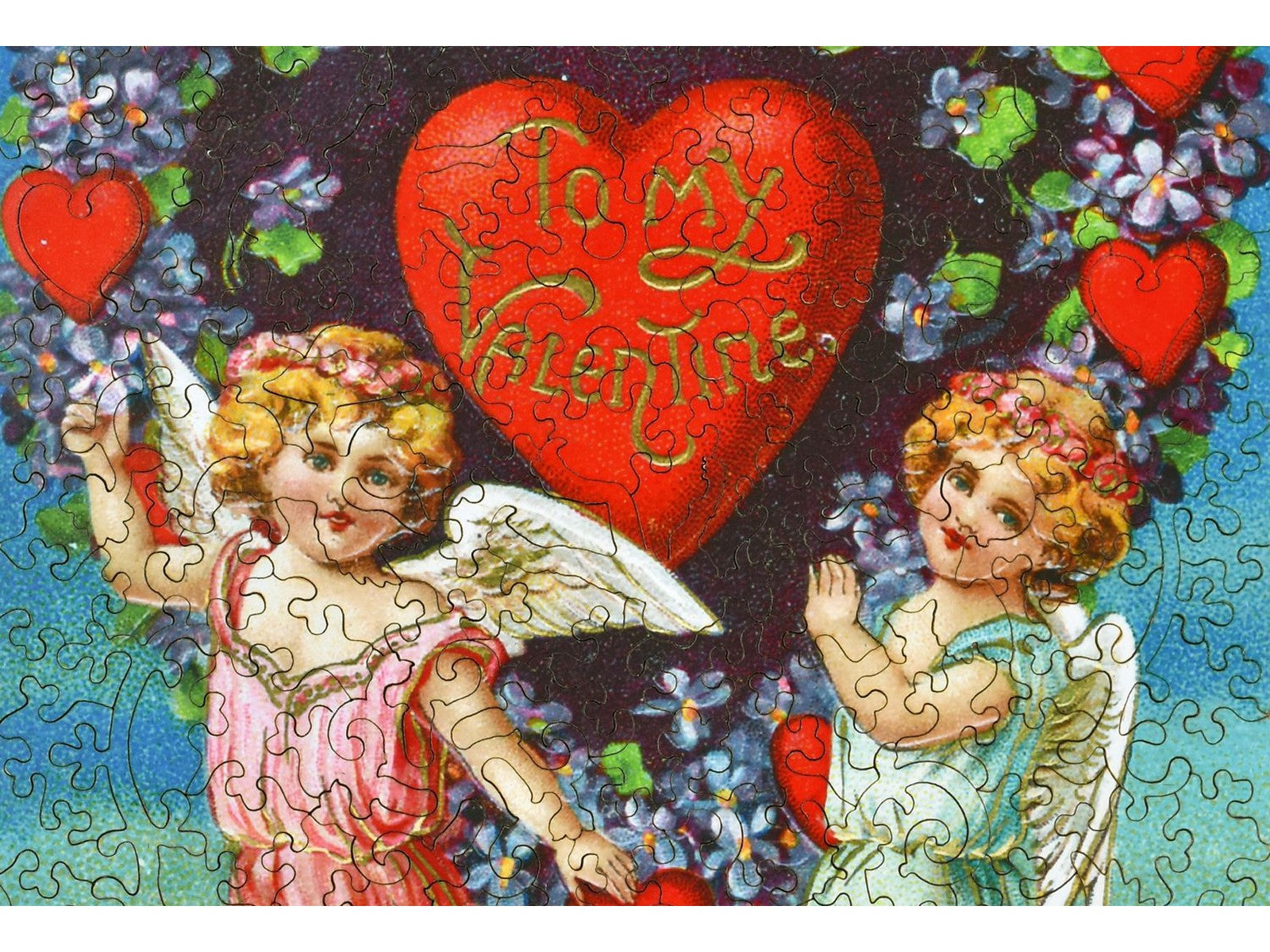 A closeup of the front of the puzzle, Valentine with Cherubs.