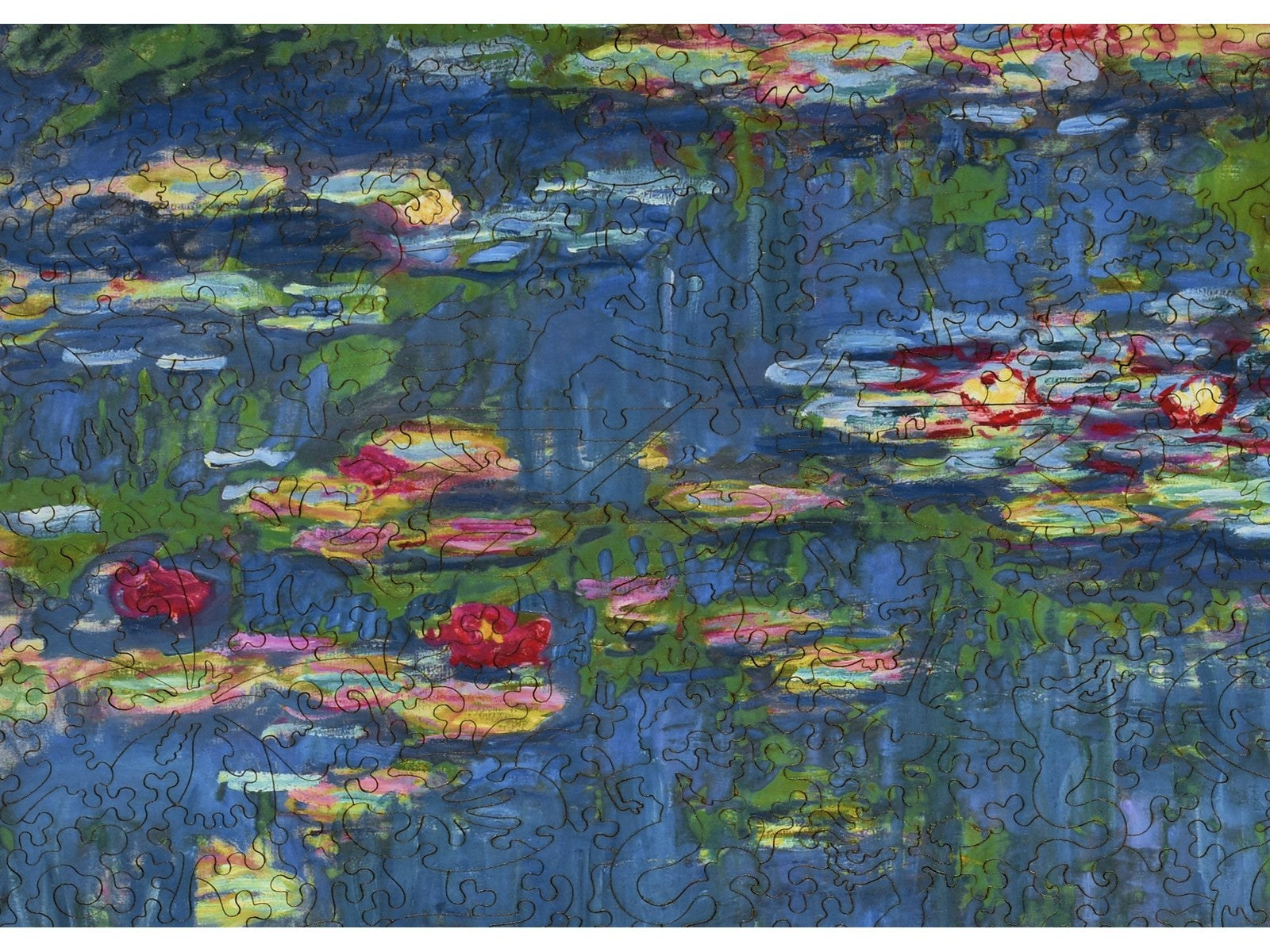 A closeup of the front of the puzzle, Water Lilies, 1916, showing the detail in the pieces.