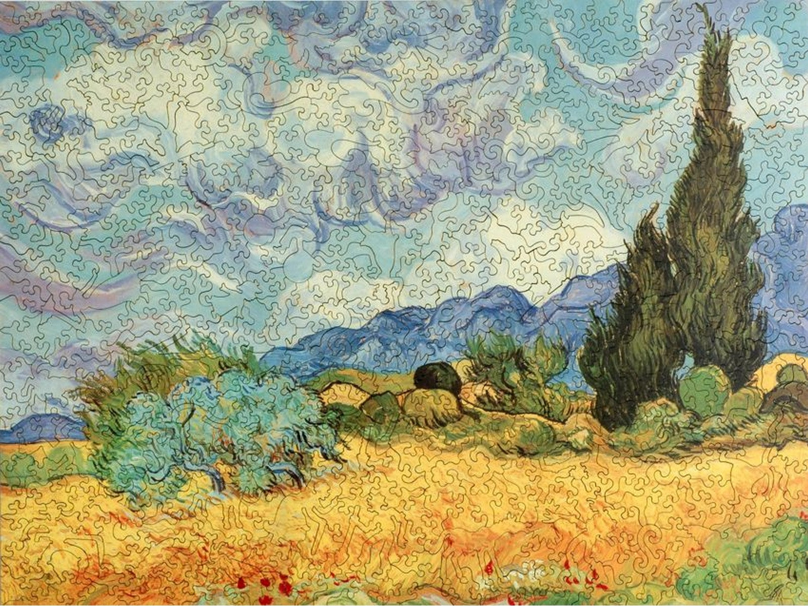 The front of the puzzle, Wheat Field with Cypresses, which shows a countryside landscape.