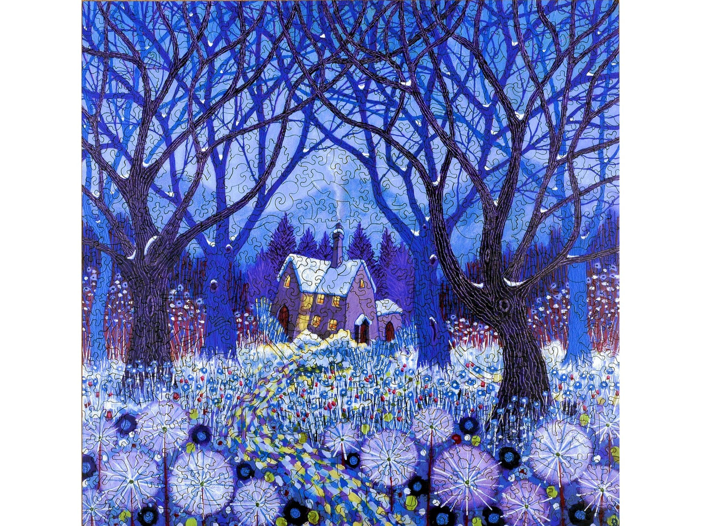 The front of the puzzle, Winterlands which shows a cottage in a winter forest.