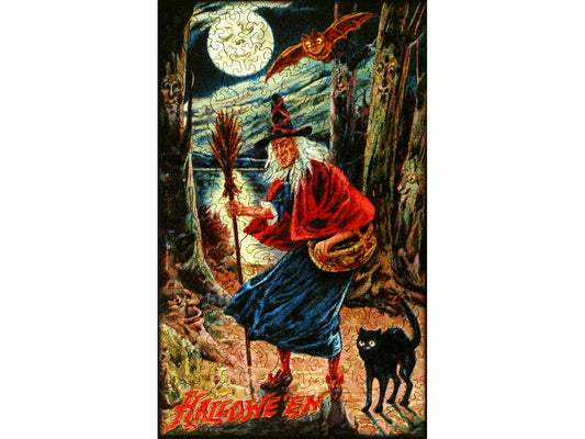The front of the puzzle, Witch Way Halloween, which shows a witch in the forest at night with a black cat.