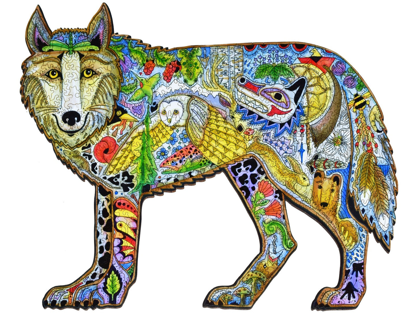 The front of the puzzle, Wolf, which shows colorful drawings of various plants and animals in the shape of a wolf.