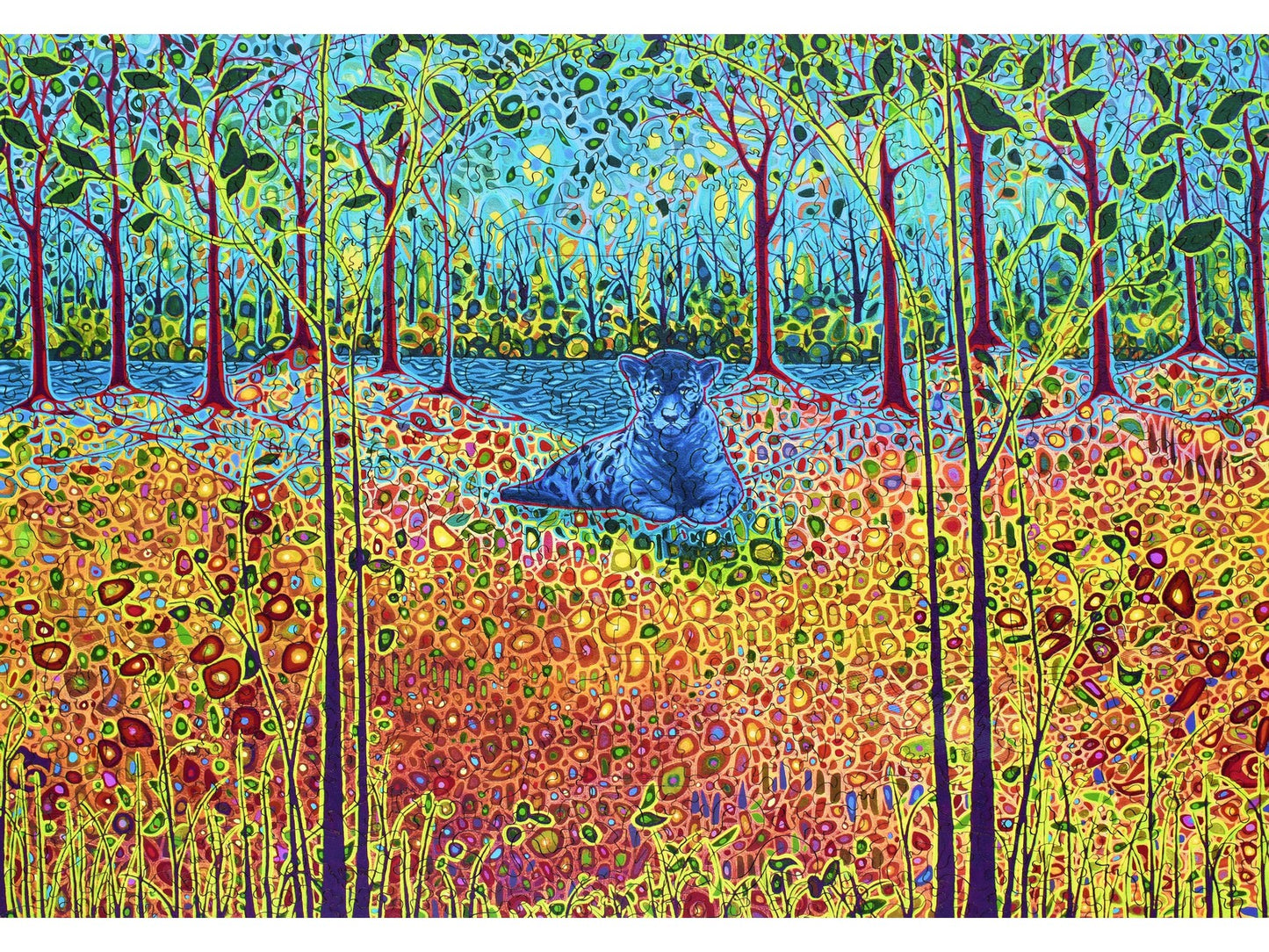 The front of the puzzle, Yanapuma, which shows a blue puma in a rainforest.